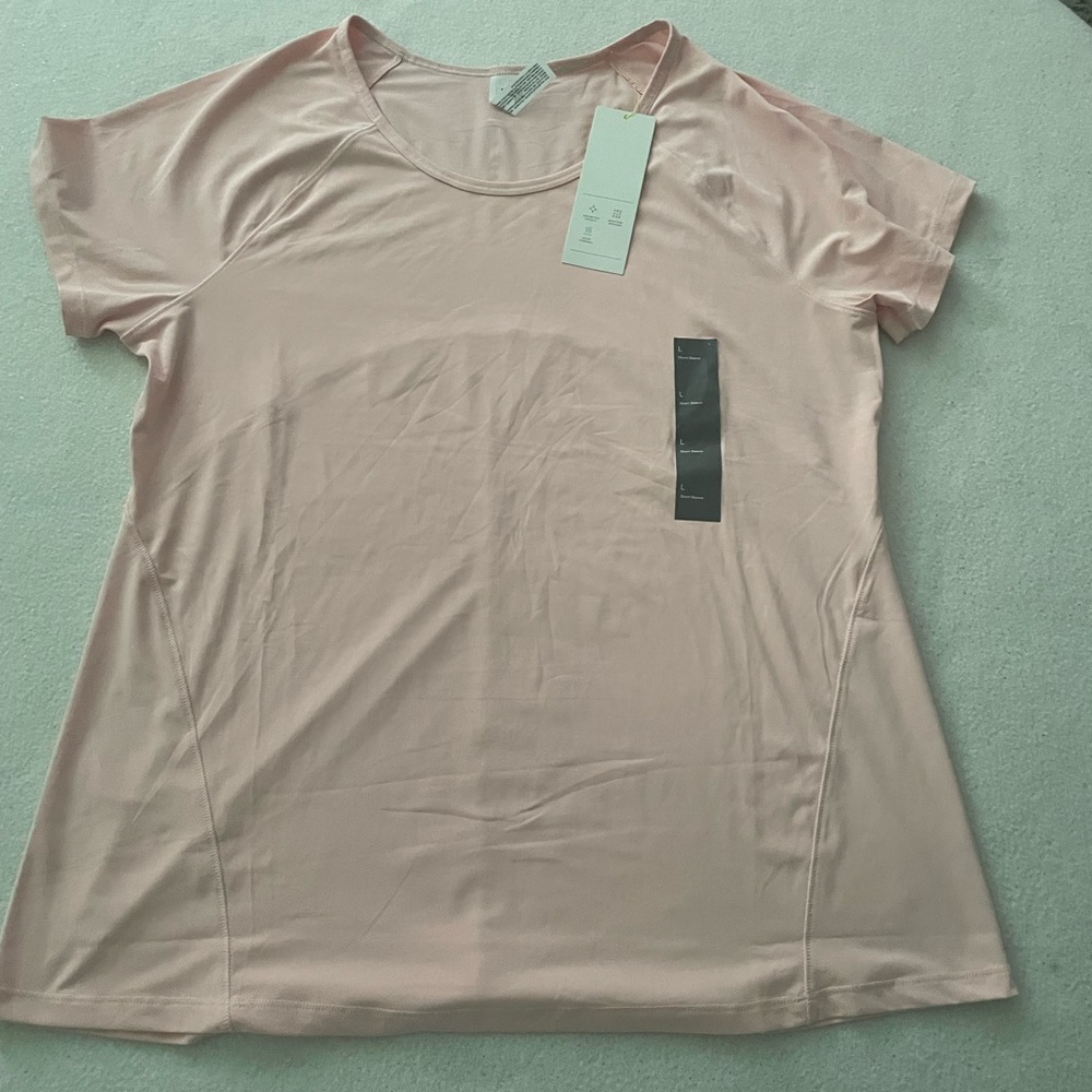 Brand new with tags All in Motion blush pink shirt sleeve top size Large.